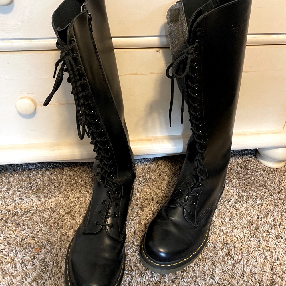 Knee-high Doc Martens.
